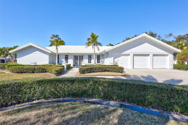 single story home with a garage