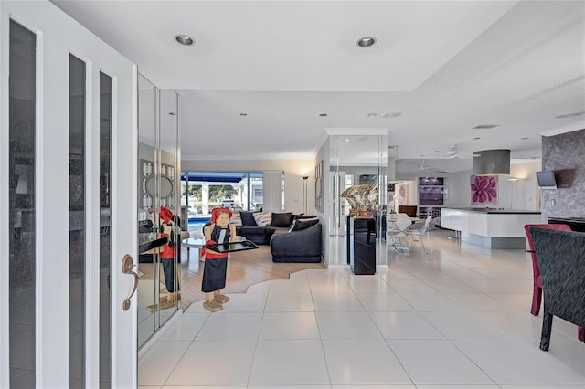 living room with light tile patterned flooring