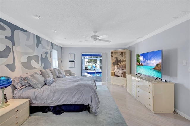 bedroom with crown molding, ceiling fan, access to exterior, light hardwood / wood-style floors, and a textured ceiling