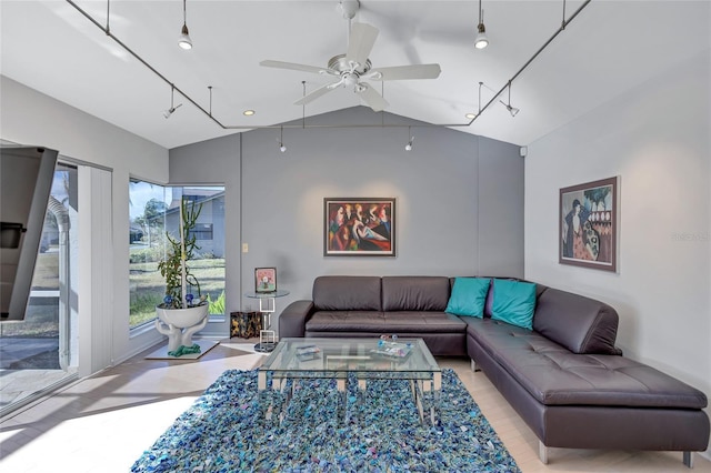 living room featuring lofted ceiling and ceiling fan