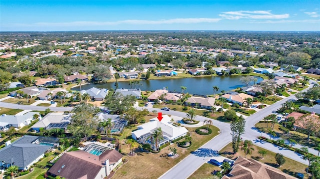 drone / aerial view with a water view