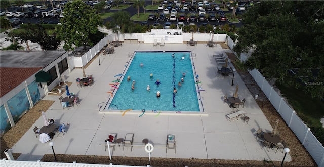 view of swimming pool featuring a patio area