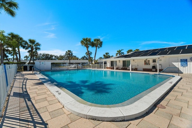 view of pool featuring a patio