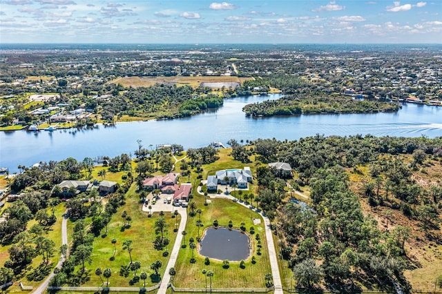 drone / aerial view with a water view