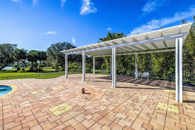 view of patio featuring a pergola