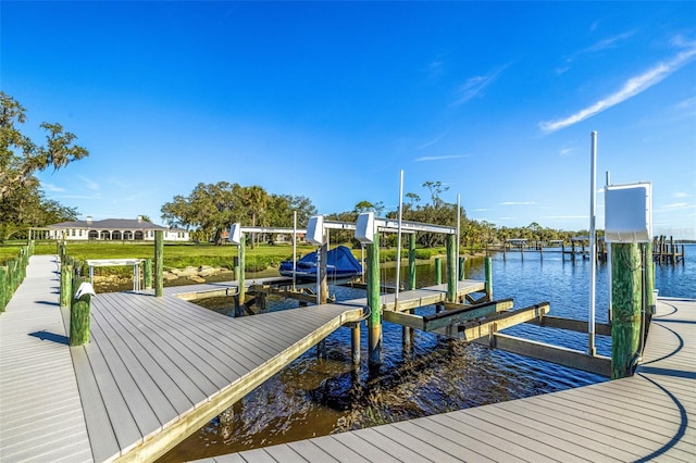 dock area featuring a water view