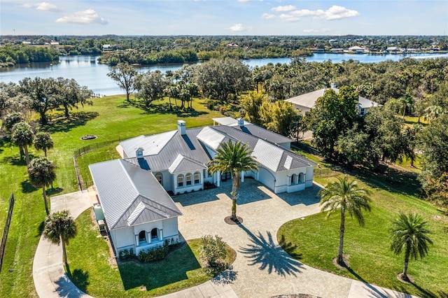 birds eye view of property featuring a water view