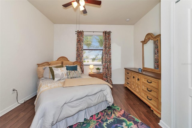 bedroom featuring dark wood-type flooring and ceiling fan