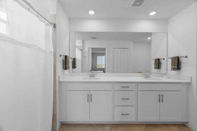 bathroom featuring vanity and tile patterned floors