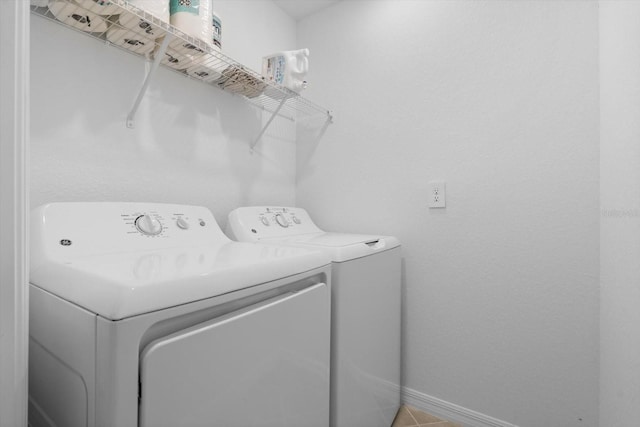 washroom with washer and clothes dryer