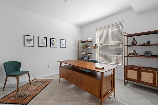 office area featuring light tile patterned flooring