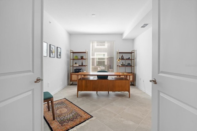 office area featuring light tile patterned floors