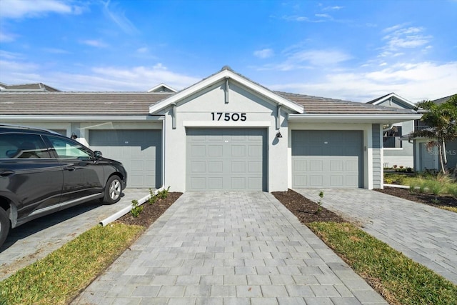 view of front of property with a garage