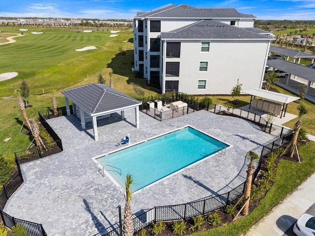 view of swimming pool with a gazebo and a patio area