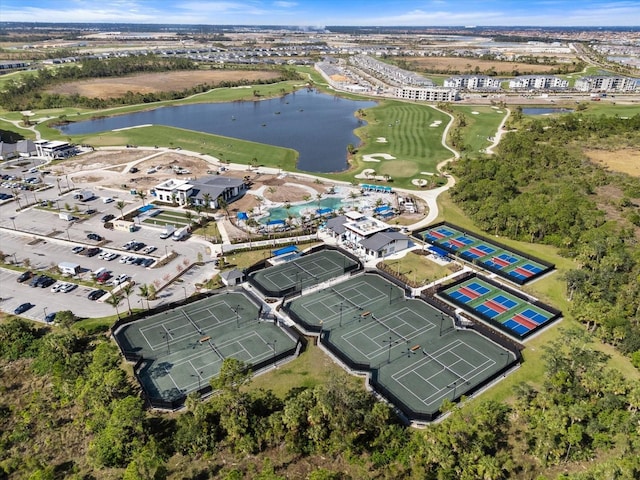 birds eye view of property with a water view