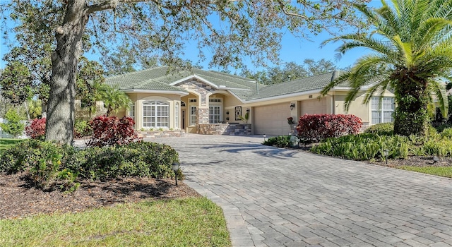 single story home featuring a garage