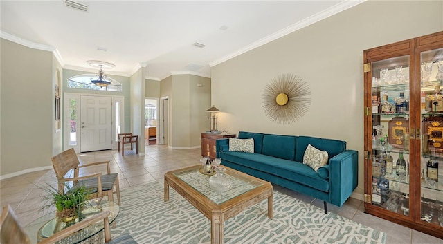 12471 Natureview Cir, Bradenton, FL 34212 - living room featuring baseboards, ornamental molding, and light tile patterned flooring