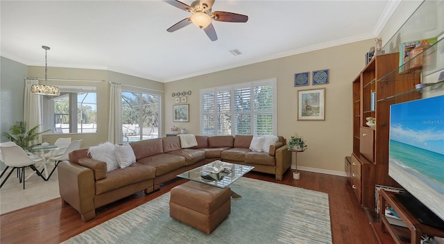 12471 Natureview Cir, Bradenton, FL 34212 - living area featuring ceiling fan, dark wood-style flooring, baseboards, and ornamental molding