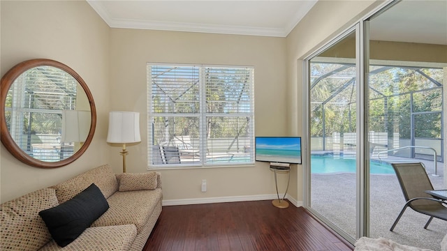 12471 Natureview Cir, Bradenton, FL 34212 - sitting room with dark wood-type flooring, plenty of natural light, baseboards, and crown molding