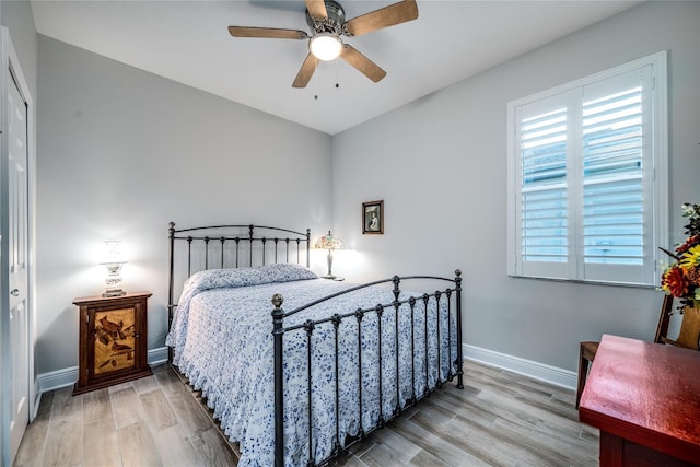 bedroom featuring ceiling fan and light wood-type flooring