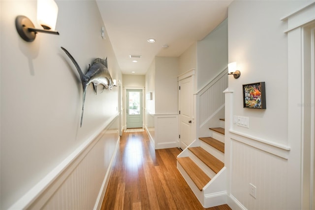 hall with light hardwood / wood-style floors