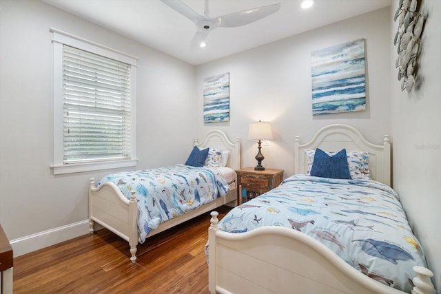 bedroom featuring ceiling fan and hardwood / wood-style floors