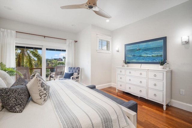 bedroom featuring access to exterior, dark hardwood / wood-style floors, and ceiling fan