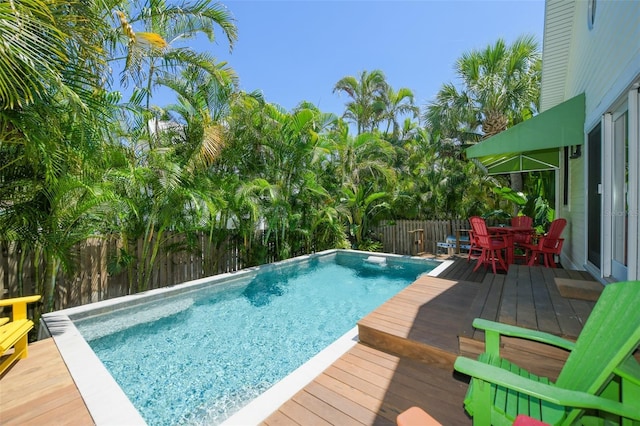 view of pool featuring a wooden deck