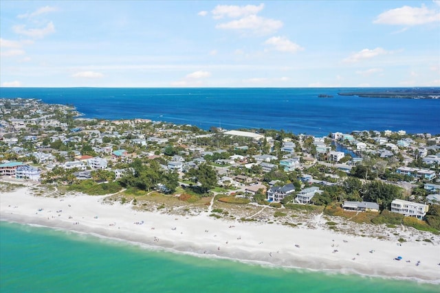 drone / aerial view with a water view and a view of the beach