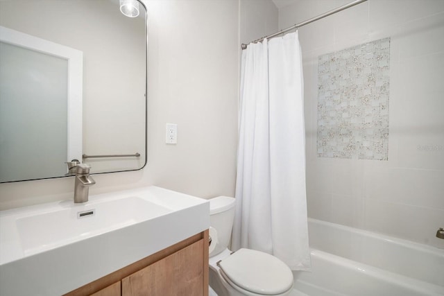 full bathroom featuring vanity, shower / bath combination with curtain, and toilet