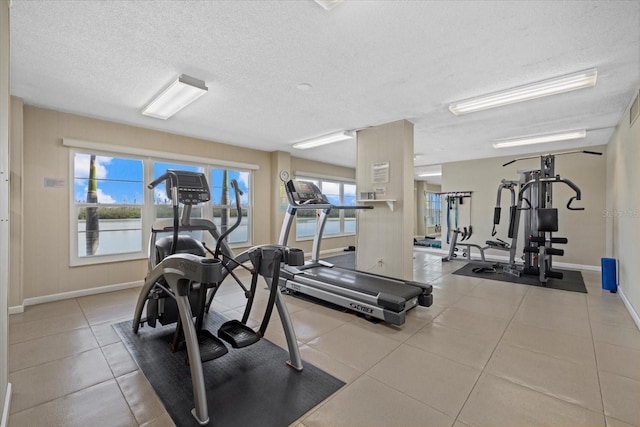 workout area with a textured ceiling