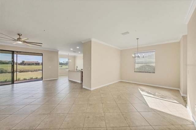 spare room featuring ornamental molding, ceiling fan with notable chandelier, and light tile patterned flooring