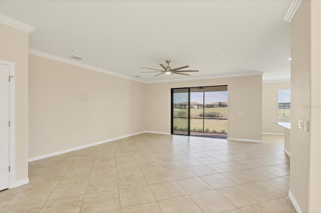 empty room featuring crown molding, ceiling fan, and light tile patterned flooring