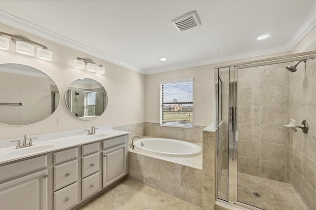 bathroom with tile patterned floors, ornamental molding, plus walk in shower, and vanity