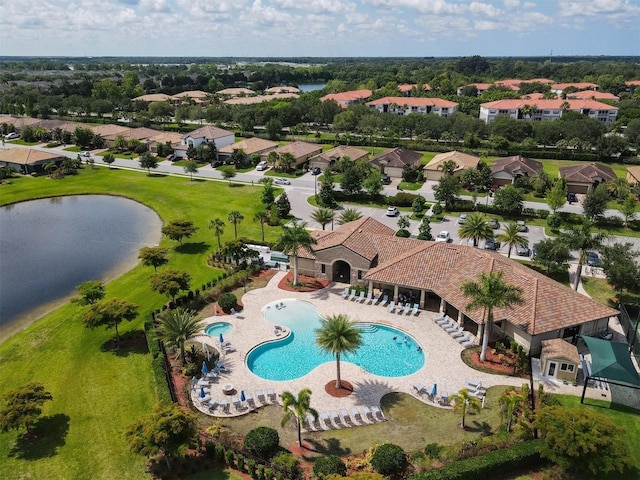 birds eye view of property featuring a water view