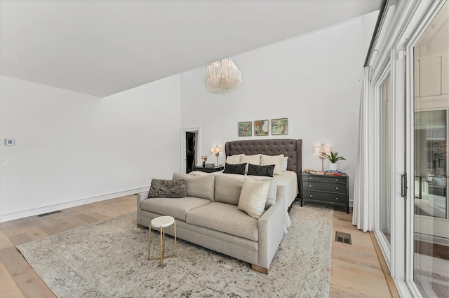 bedroom with light hardwood / wood-style flooring