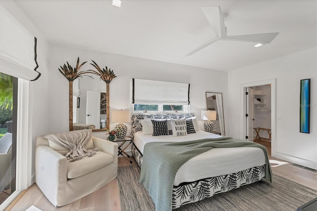 bedroom with wood-type flooring