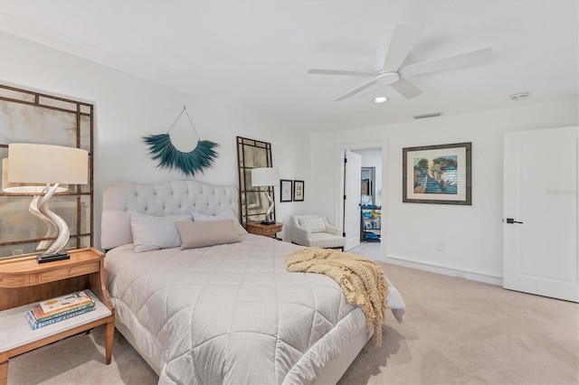 carpeted bedroom with ceiling fan