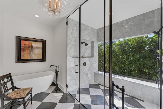 bathroom featuring independent shower and bath