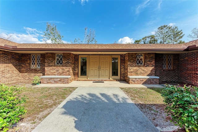 doorway to property featuring a porch