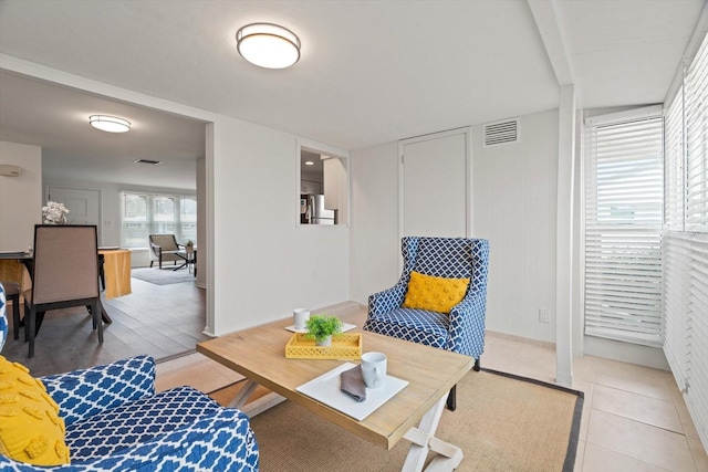 sitting room with light tile patterned floors