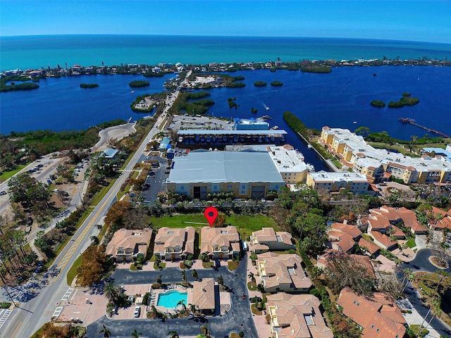 bird's eye view with a water view