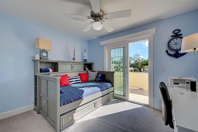 bedroom with light carpet, access to exterior, and ceiling fan