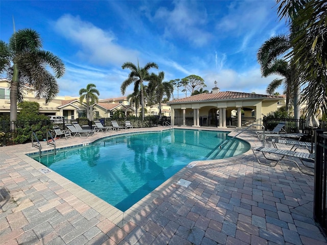 view of swimming pool featuring a patio