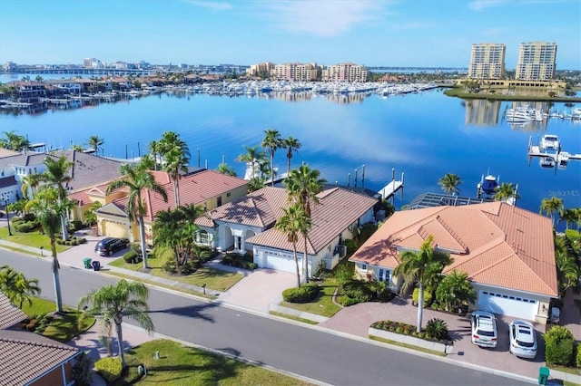 birds eye view of property with a water view