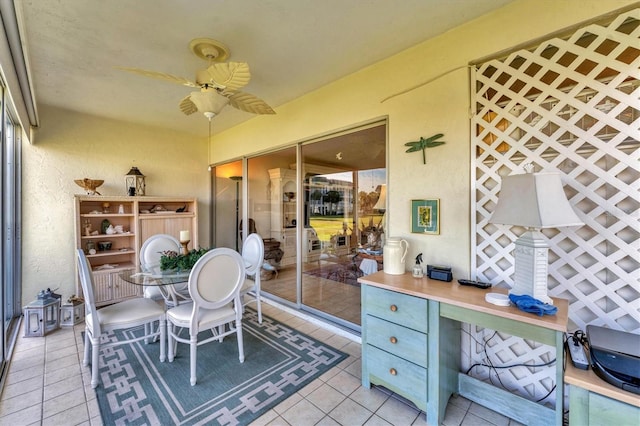 interior space featuring ceiling fan