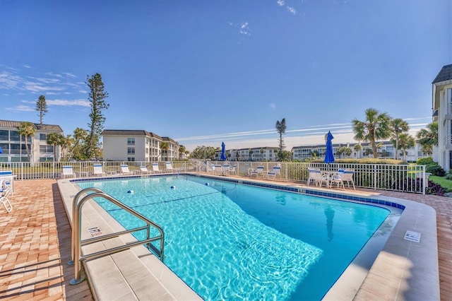 view of pool featuring a patio area