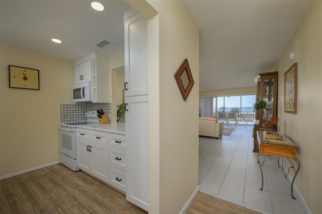 hall featuring light hardwood / wood-style floors