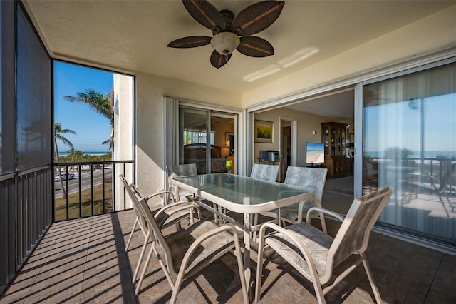 balcony featuring ceiling fan