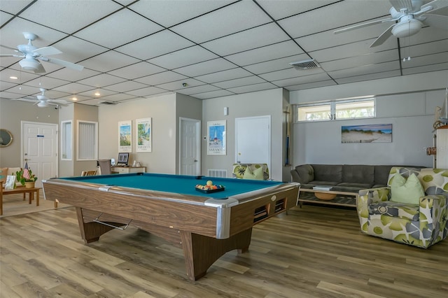 game room featuring ceiling fan, billiards, wood-type flooring, and a paneled ceiling